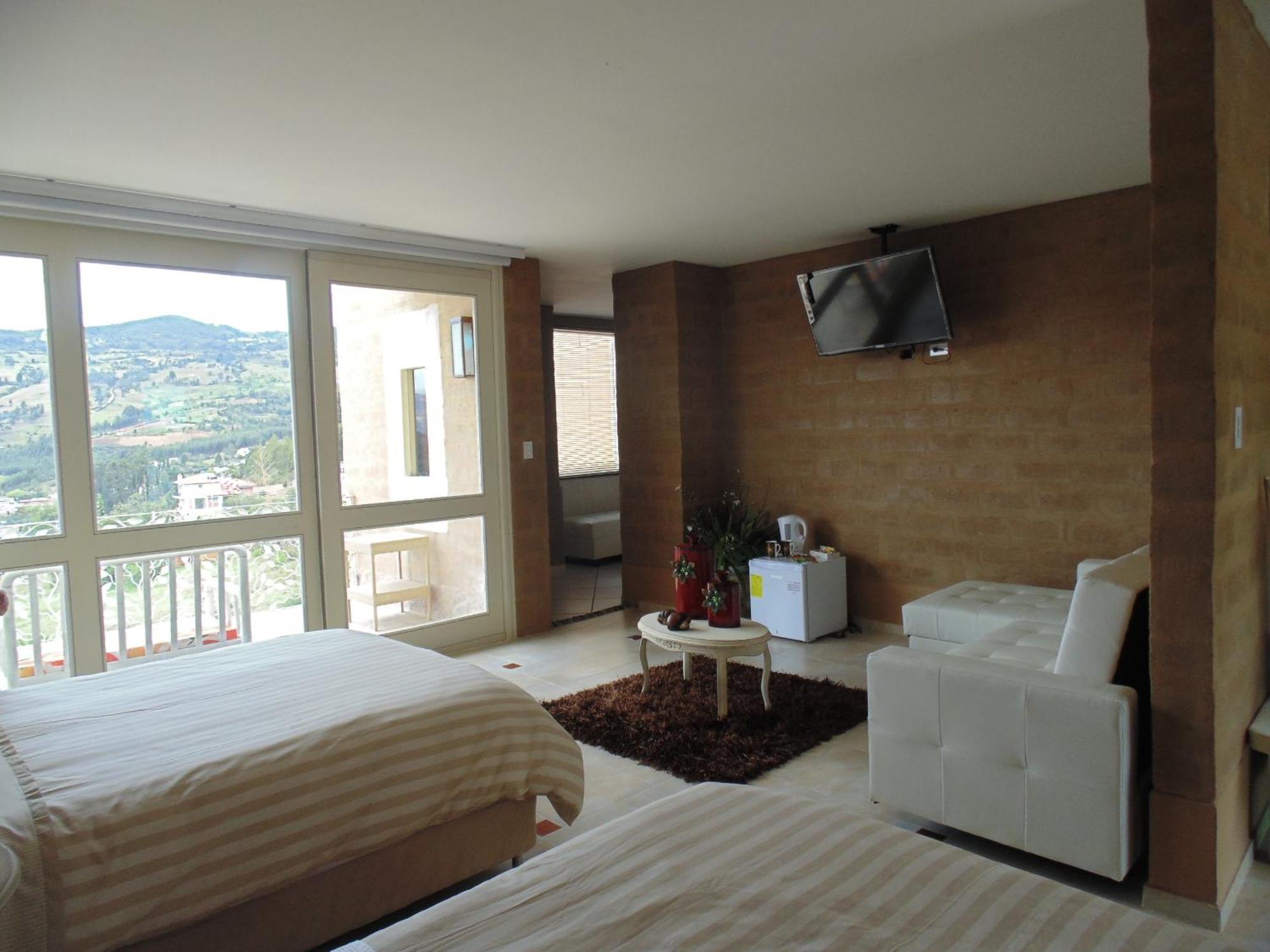 Bella Tierra Hotel Boutique Тибасоса Номер фото