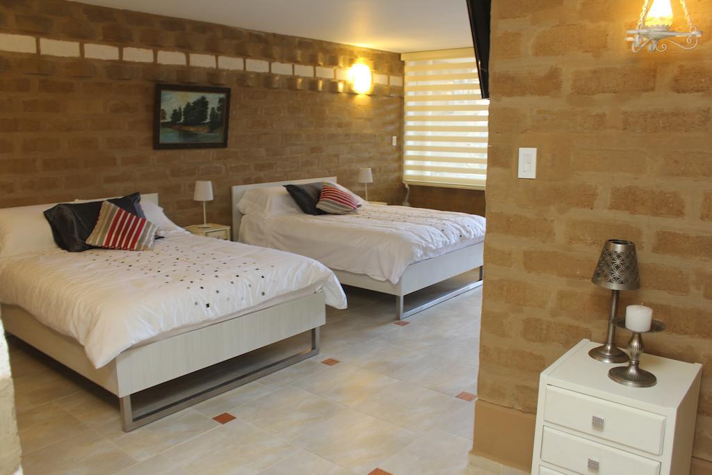 Bella Tierra Hotel Boutique Тибасоса Экстерьер фото