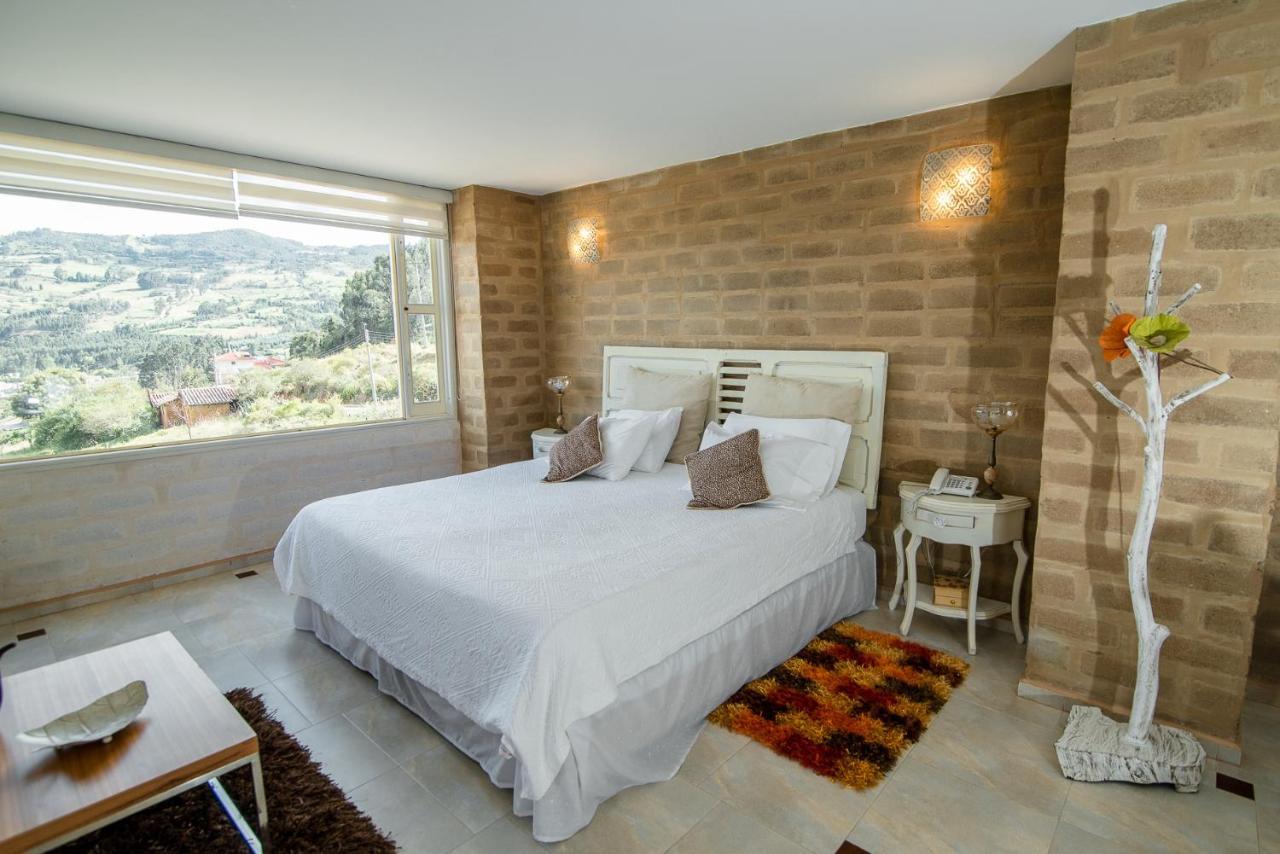 Bella Tierra Hotel Boutique Тибасоса Экстерьер фото