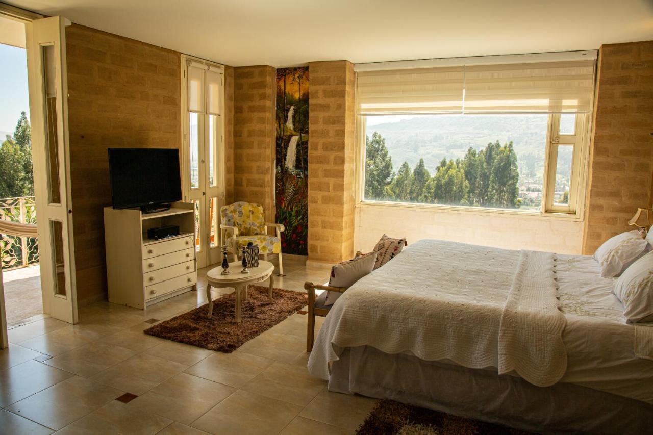 Bella Tierra Hotel Boutique Тибасоса Экстерьер фото